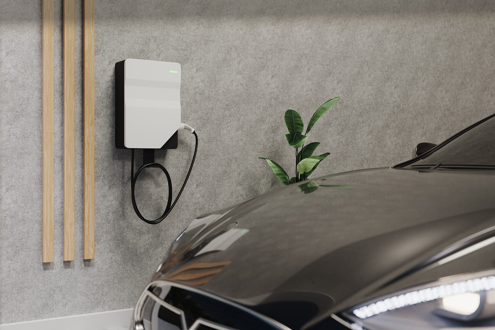Wallbox an einer Hauswand mit Elektroauto